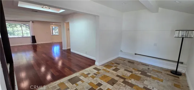a view of room with hardwood floor