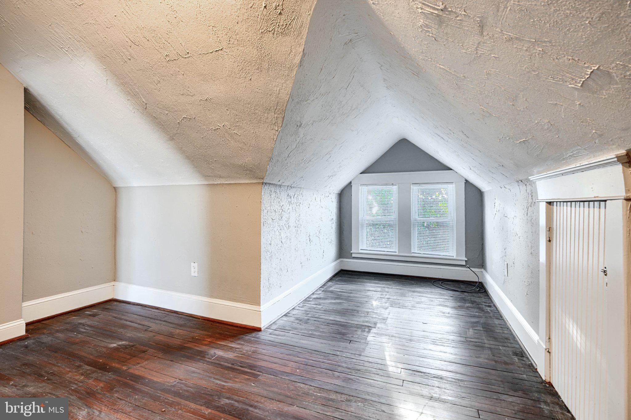 3414 Alto Road, Unit 2 Baltimore, MD 21216 - Photo 19 of 25 Charming attic space with natural light.