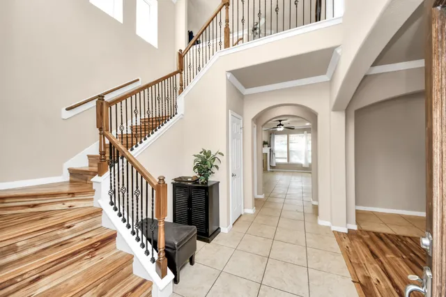 a view of entryway with wooden floor and a rug