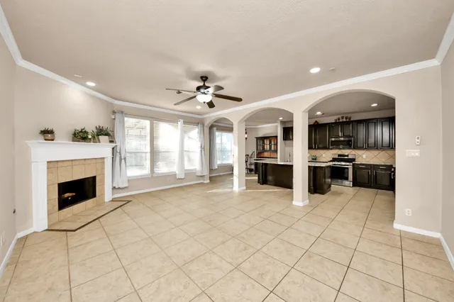 a view of a kitchen with furniture and a fireplace