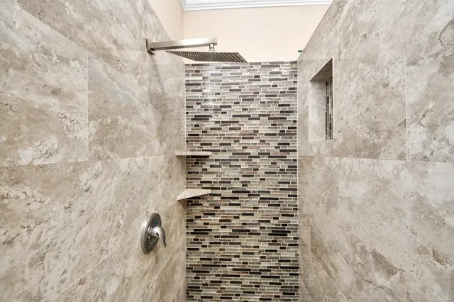 a view of a room with wooden floor and staircase
