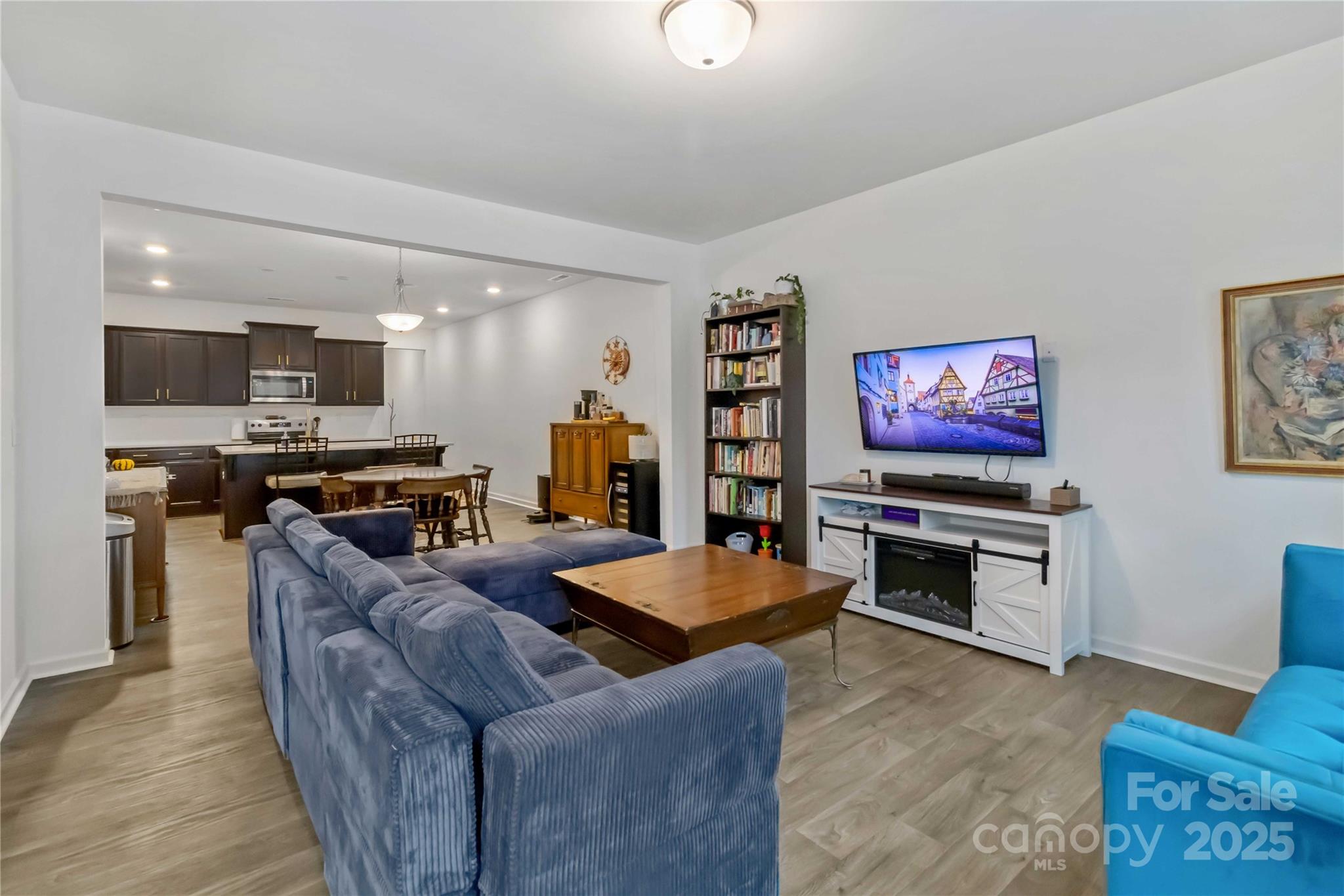684 Candela Court York, SC 29745 - Photo 13 of 28 a living room with furniture and a flat screen tv