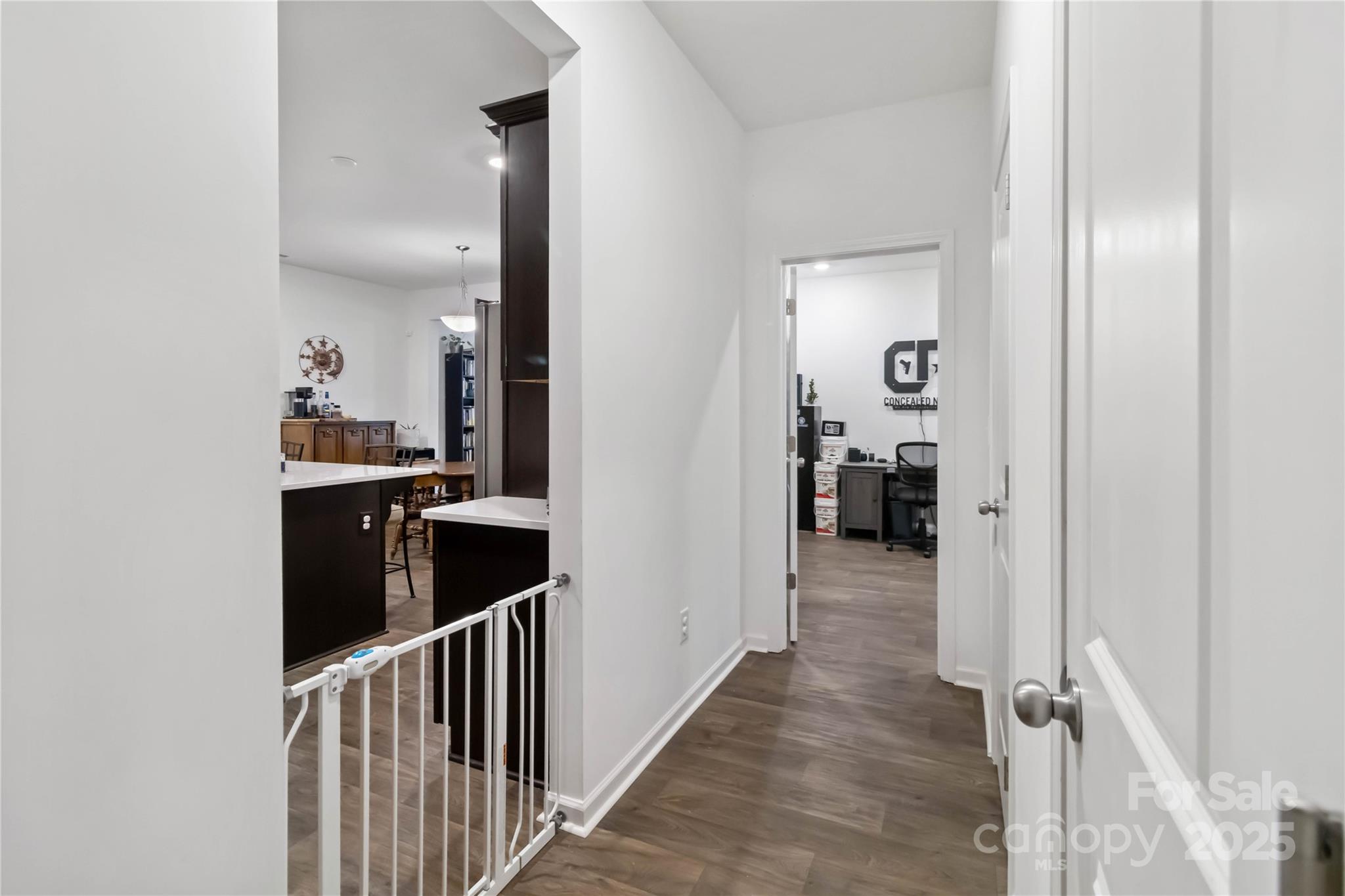 684 Candela Court York, SC 29745 - Photo 16 of 28 a view of a hallway view with wooden floor and staircase