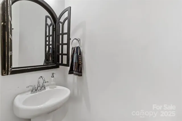 a view of a hallway with a bedroom