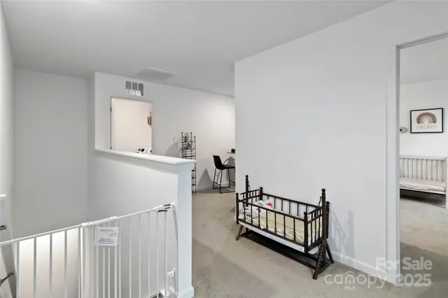 a view of room with window and hardwood floor