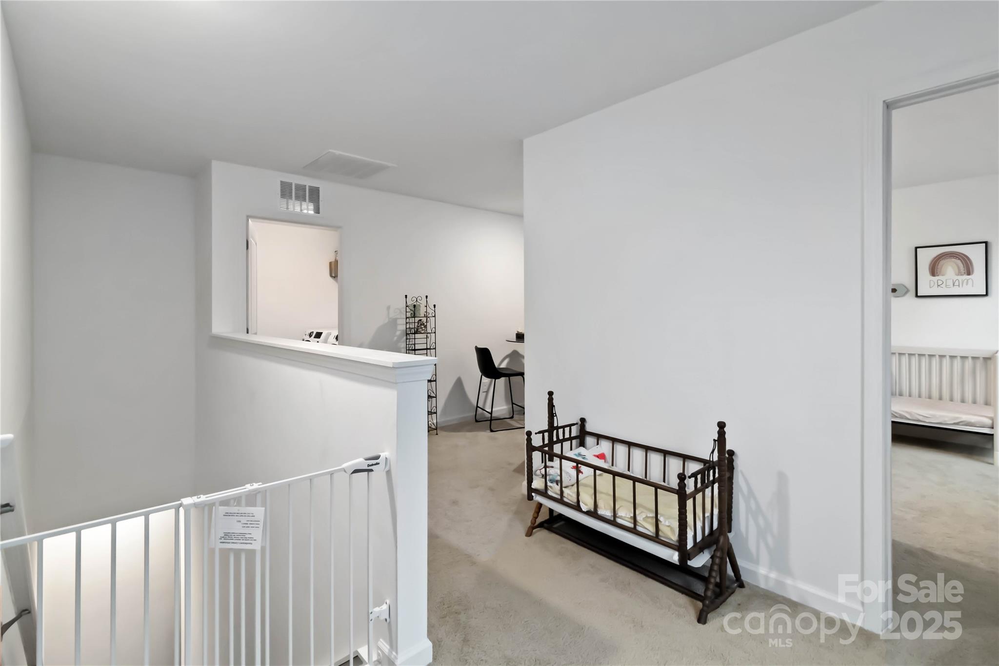 684 Candela Court York, SC 29745 - Photo 18 of 28 a view of a hallway with a bedroom