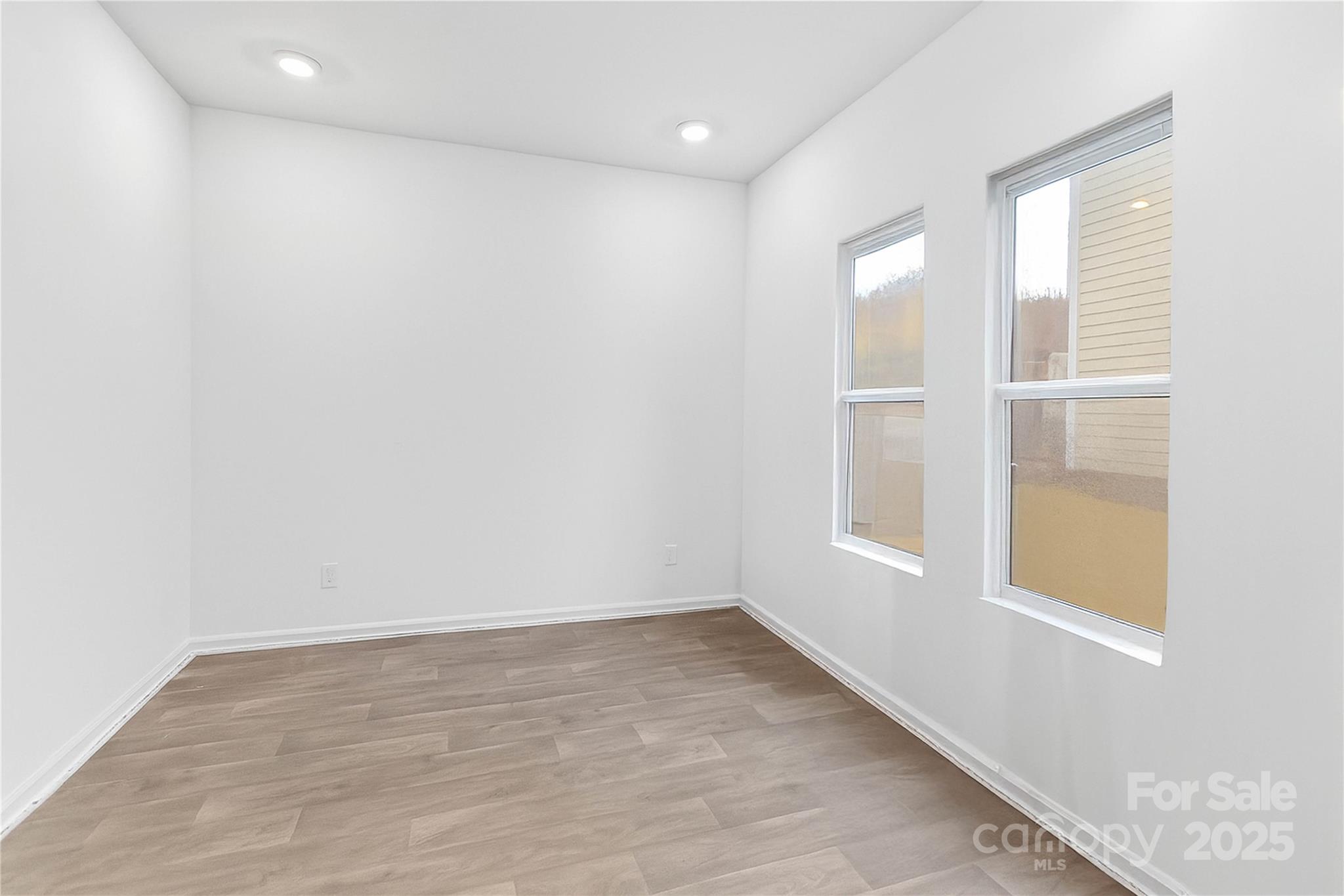 684 Candela Court York, SC 29745 - Photo 19 of 28 a view of room with window and hardwood floor