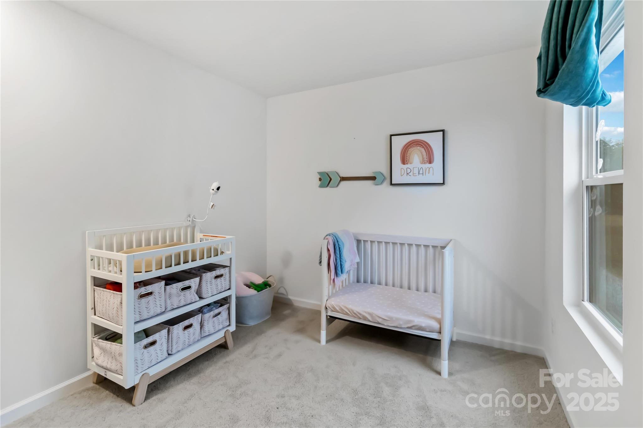 684 Candela Court York, SC 29745 - Photo 24 of 28 a bedroom with a bed and a window