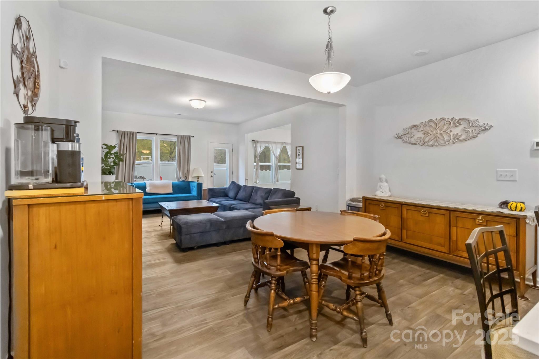 684 Candela Court York, SC 29745 - Photo 6 of 28 a dining room with furniture and a chandelier