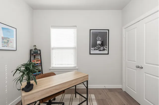 a room with furniture and wooden floor
