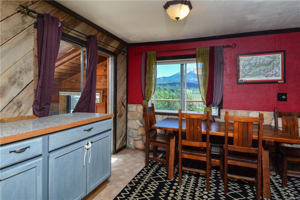 89 V Road Silverthorne, CO 80498 - Photo 5 of 25 a view of a dining room with furniture and window