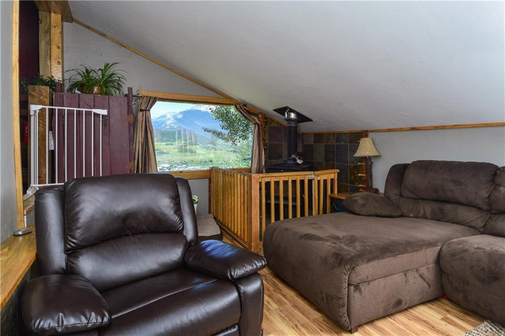 89 V Road Silverthorne, CO 80498 - Photo 8 of 25 a balcony with furniture and a large window