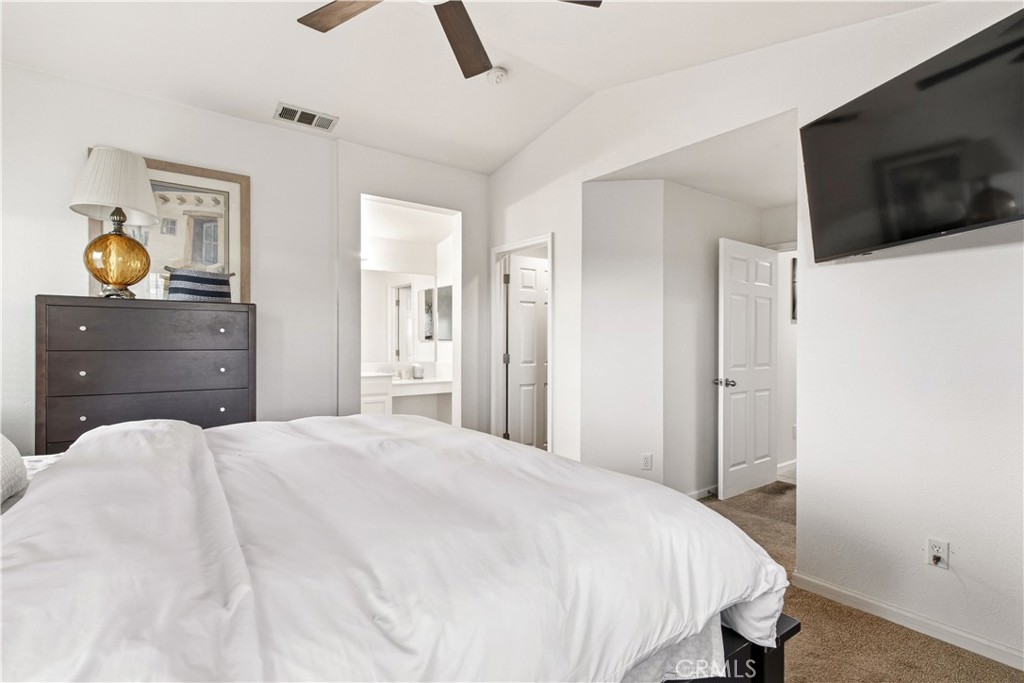 1478 La Sierra Street Merced, CA 95348 - Photo 17 of 32 a bedroom with a bed and flat screen tv