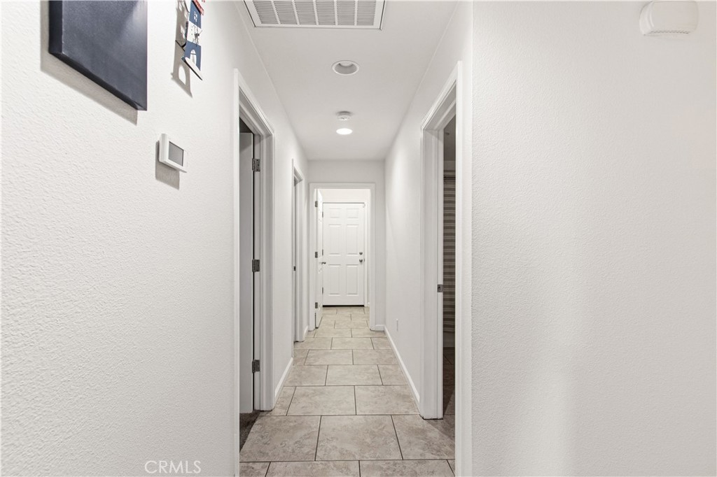 1478 La Sierra Street Merced, CA 95348 - Photo 23 of 32 a view of a hallway