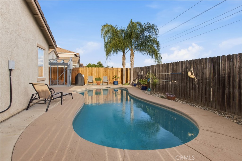 1478 La Sierra Street Merced, CA 95348 - Photo 3 of 32 swimming pool view with a outdoor space