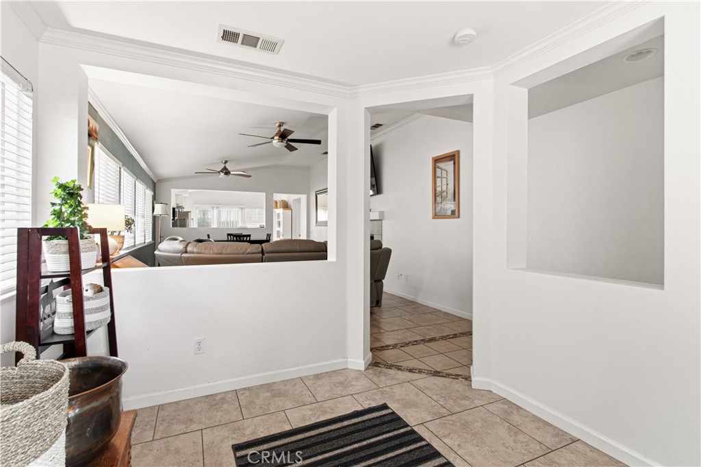 1478 La Sierra Street Merced, CA 95348 - Photo 6 of 32 a view of kitchen with furniture and wooden floor