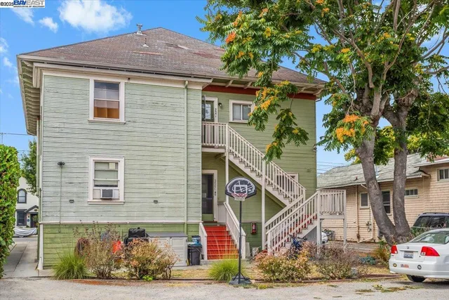 a backyard of a house with seating space