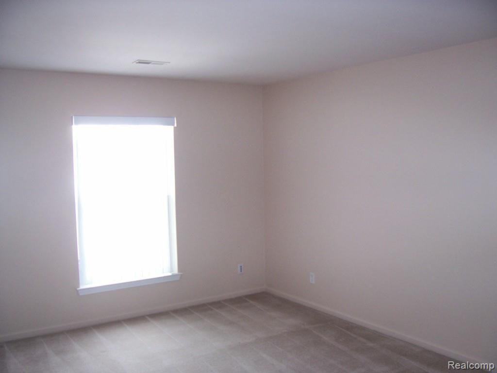5306 Brookemonte Circle, Unit 353 Rochester, MI 48306 - Photo 14 of 21 14_Bedroom.jpg