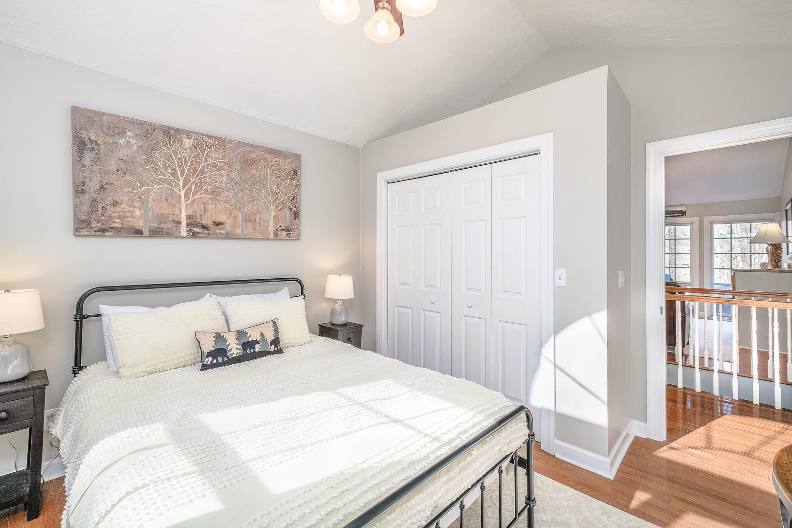 2085 Lakewood Forest Road Moneta, VA 24121 - Photo 28 of 76 a bedroom with a bed and wooden floor