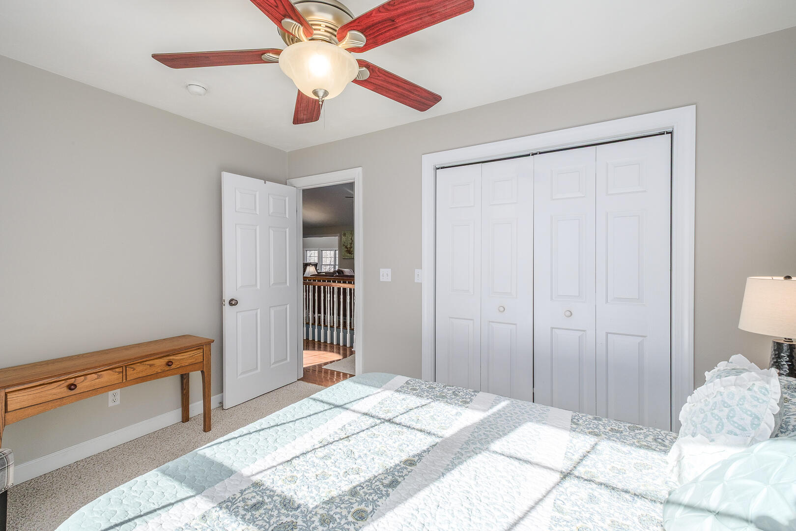 2085 Lakewood Forest Road Moneta, VA 24121 - Photo 30 of 76 a bedroom with a bed and a chandelier