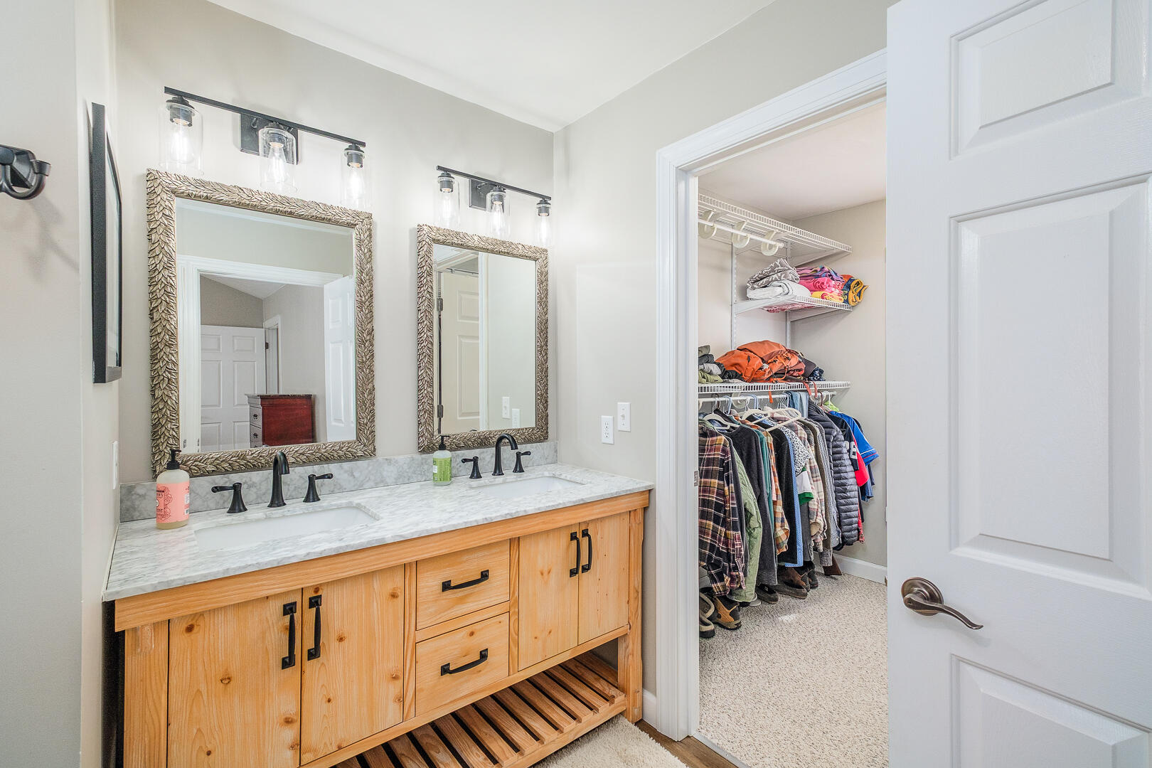2085 Lakewood Forest Road Moneta, VA 24121 - Photo 36 of 76 a bathroom with a double vanity sink and a mirror