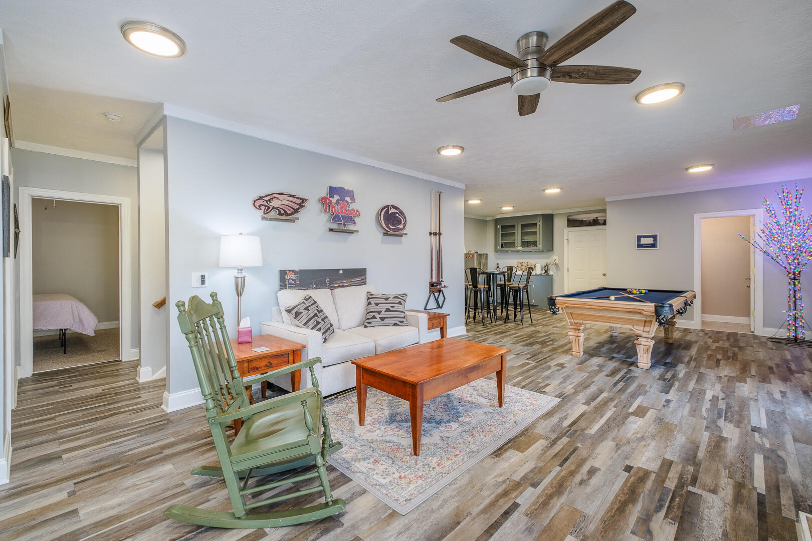 2085 Lakewood Forest Road Moneta, VA 24121 - Photo 42 of 76 a living room with furniture and a wooden floor