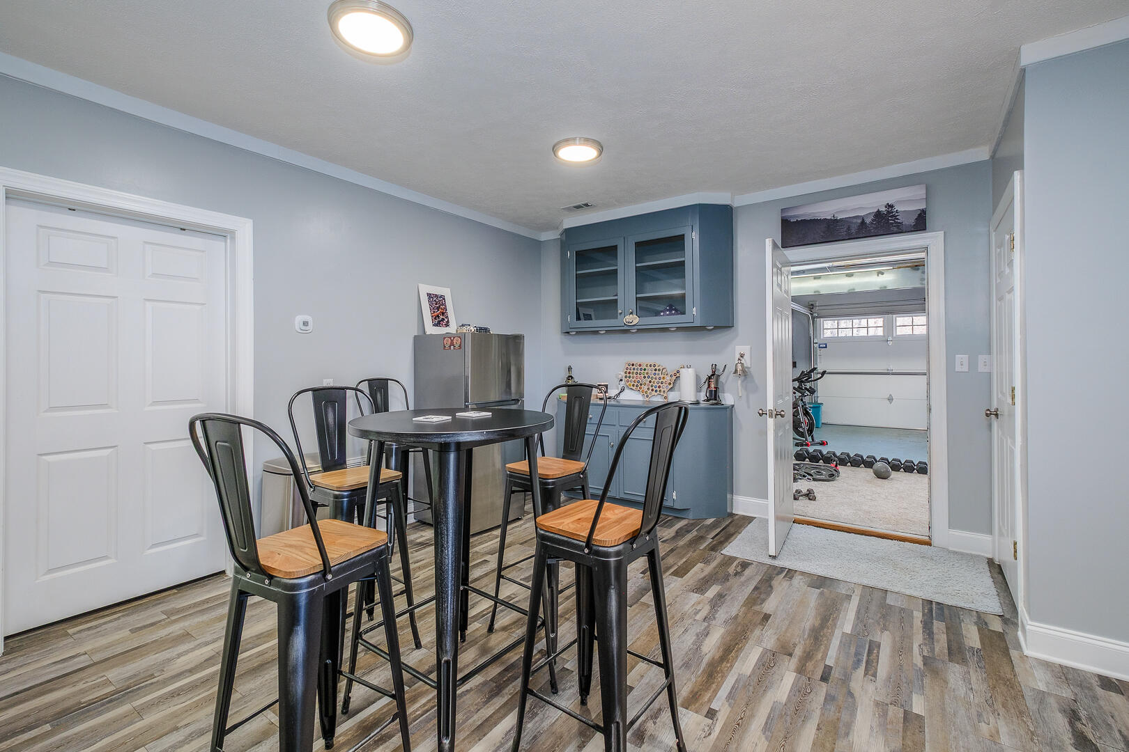 2085 Lakewood Forest Road Moneta, VA 24121 - Photo 54 of 76 a view of a dining room with furniture and wooden floor