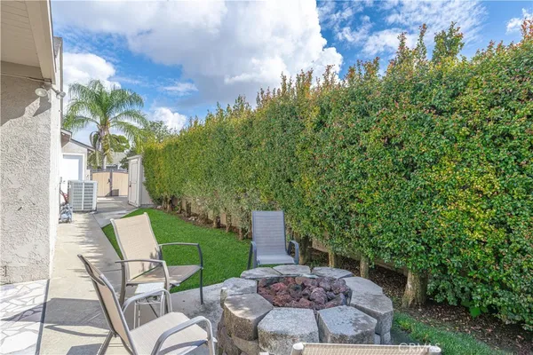 a view of a tiny house with a yard