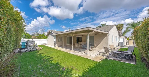 a view of an outdoor sitting area with furniture