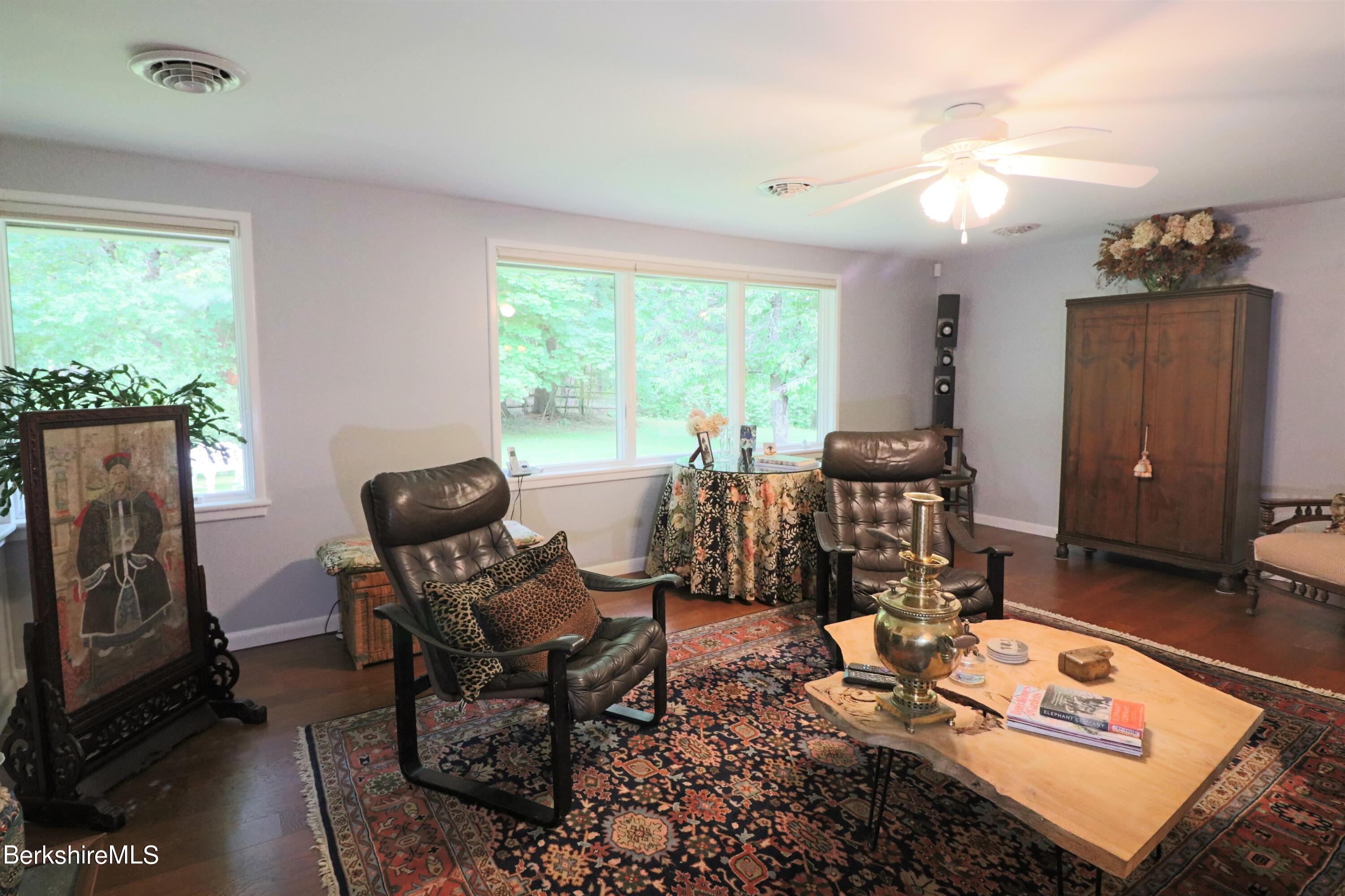 13 Cherry Hill Road Stockbridge, MA 01262 - Photo 14 of 41 a living room with furniture a rug and a large window