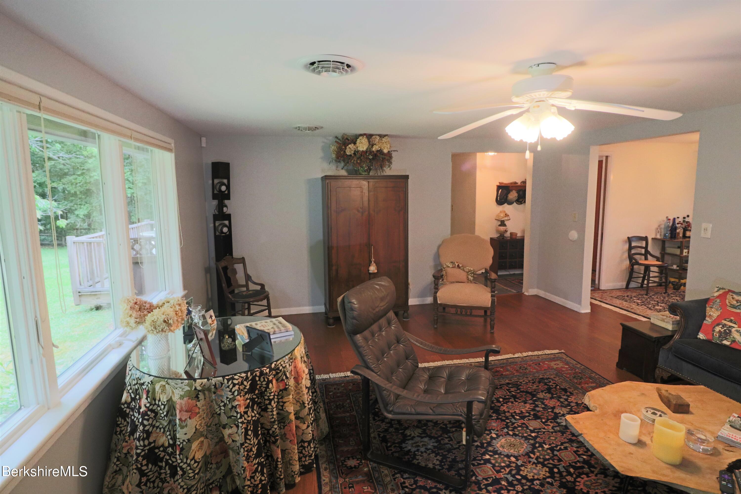 13 Cherry Hill Road Stockbridge, MA 01262 - Photo 15 of 41 a living room with furniture and a large window