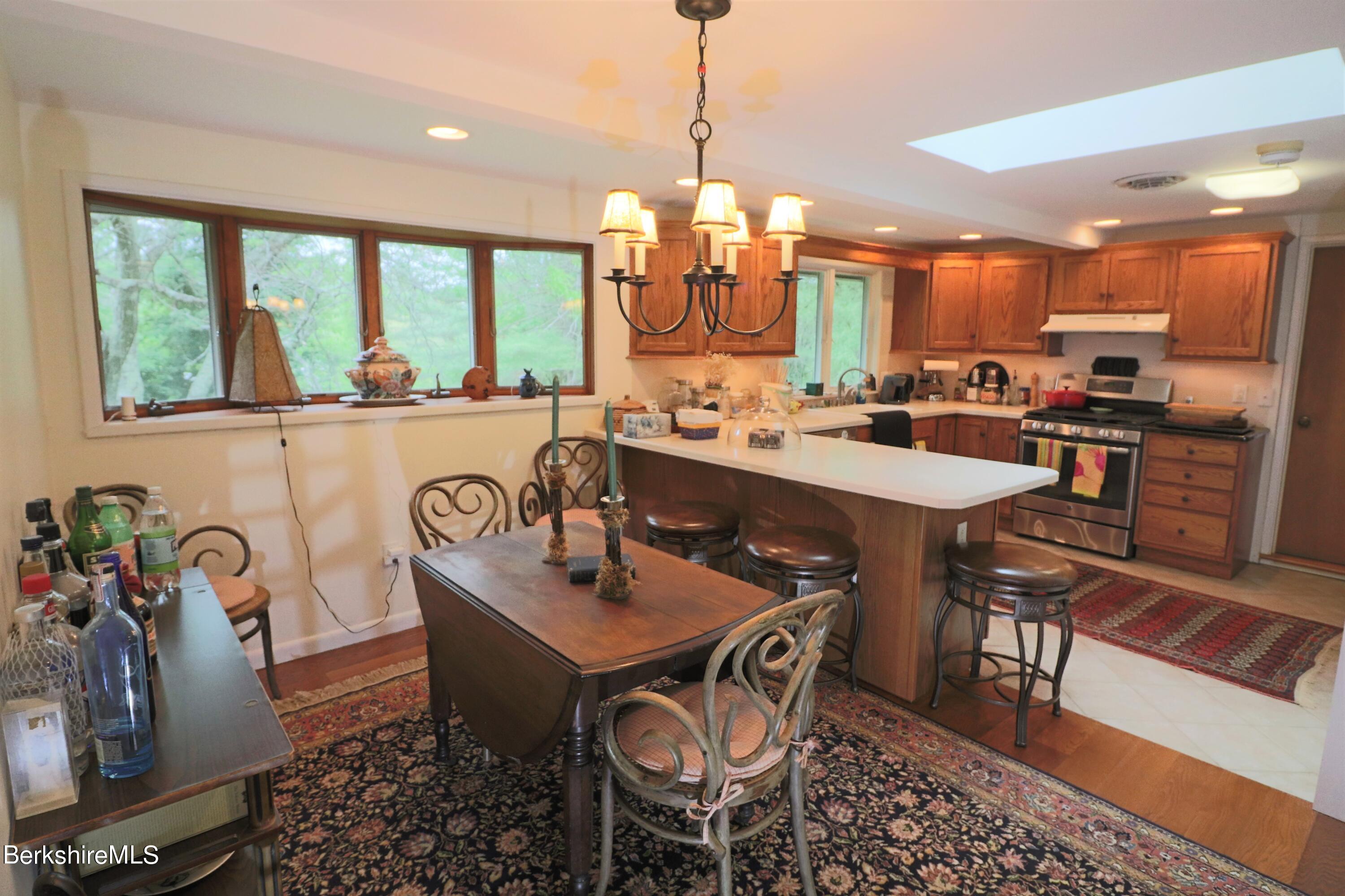 13 Cherry Hill Road Stockbridge, MA 01262 - Photo 18 of 41 a view of a dining room with furniture window and wooden floor