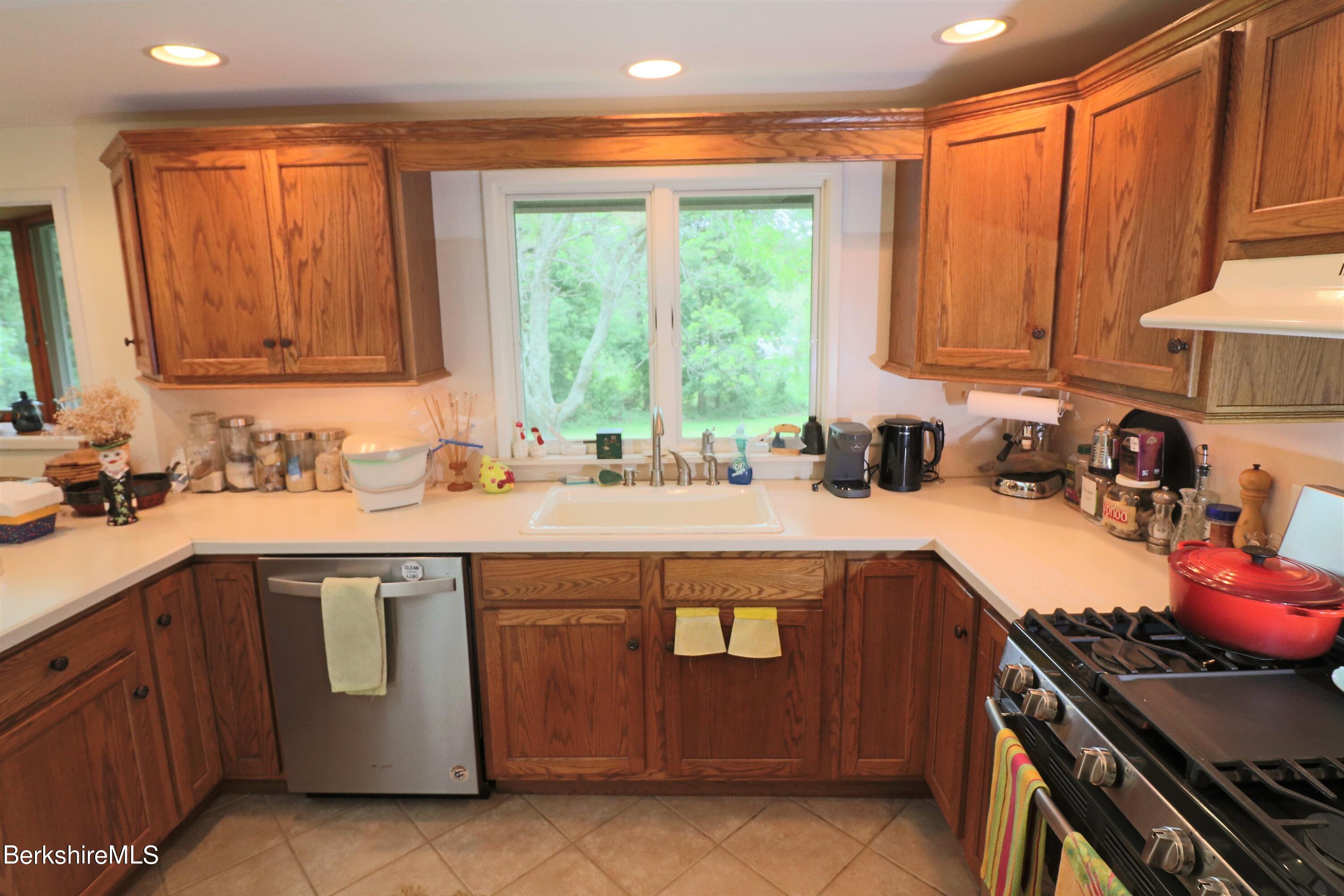 13 Cherry Hill Road Stockbridge, MA 01262 - Photo 22 of 41 a kitchen with a sink stove and cabinets
