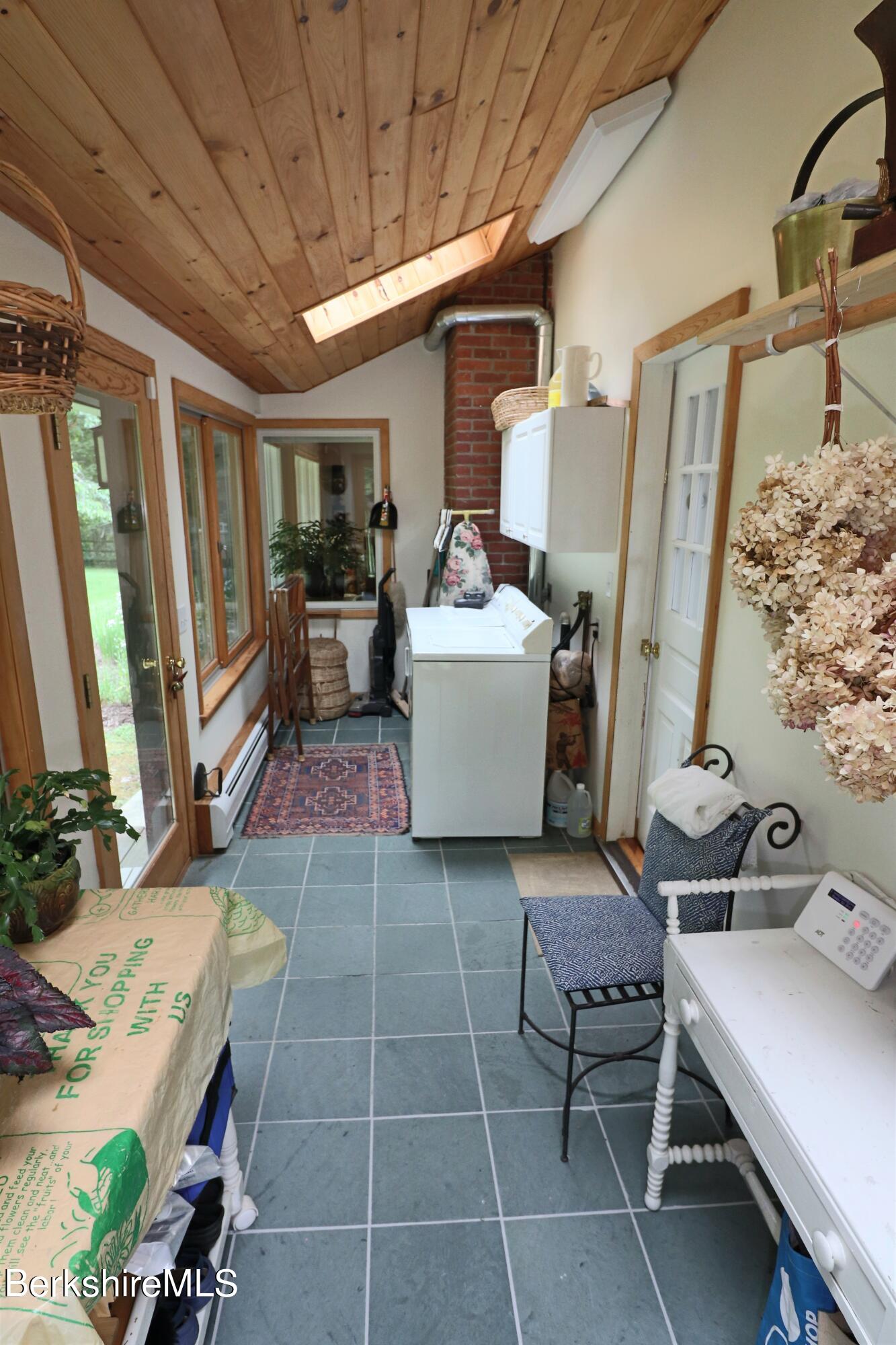 13 Cherry Hill Road Stockbridge, MA 01262 - Photo 38 of 41 a living room with furniture and a window