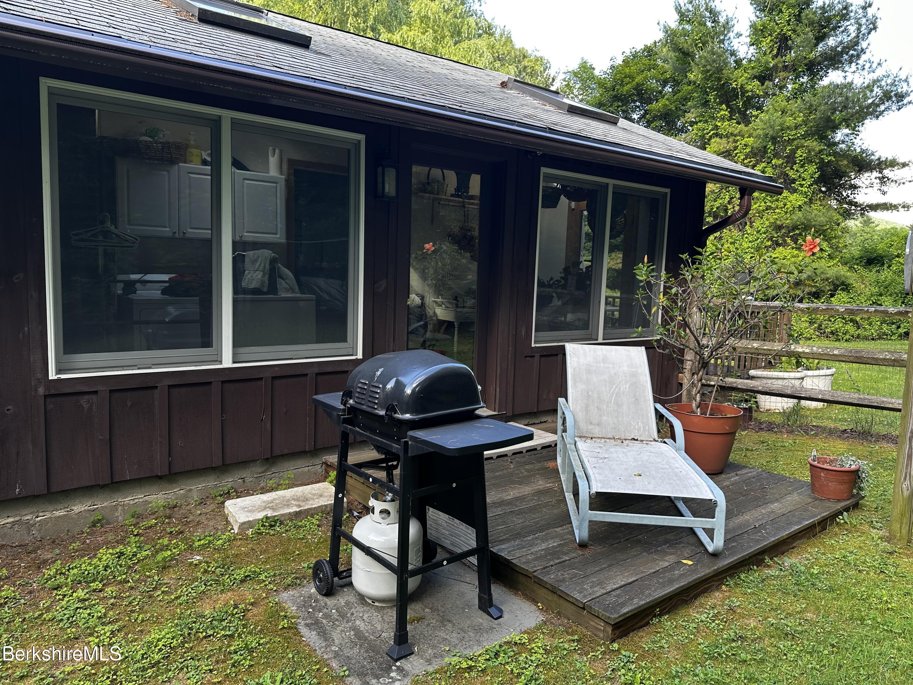 13 Cherry Hill Road Stockbridge, MA 01262 - Photo 5 of 41 a view of a backyard with sitting area