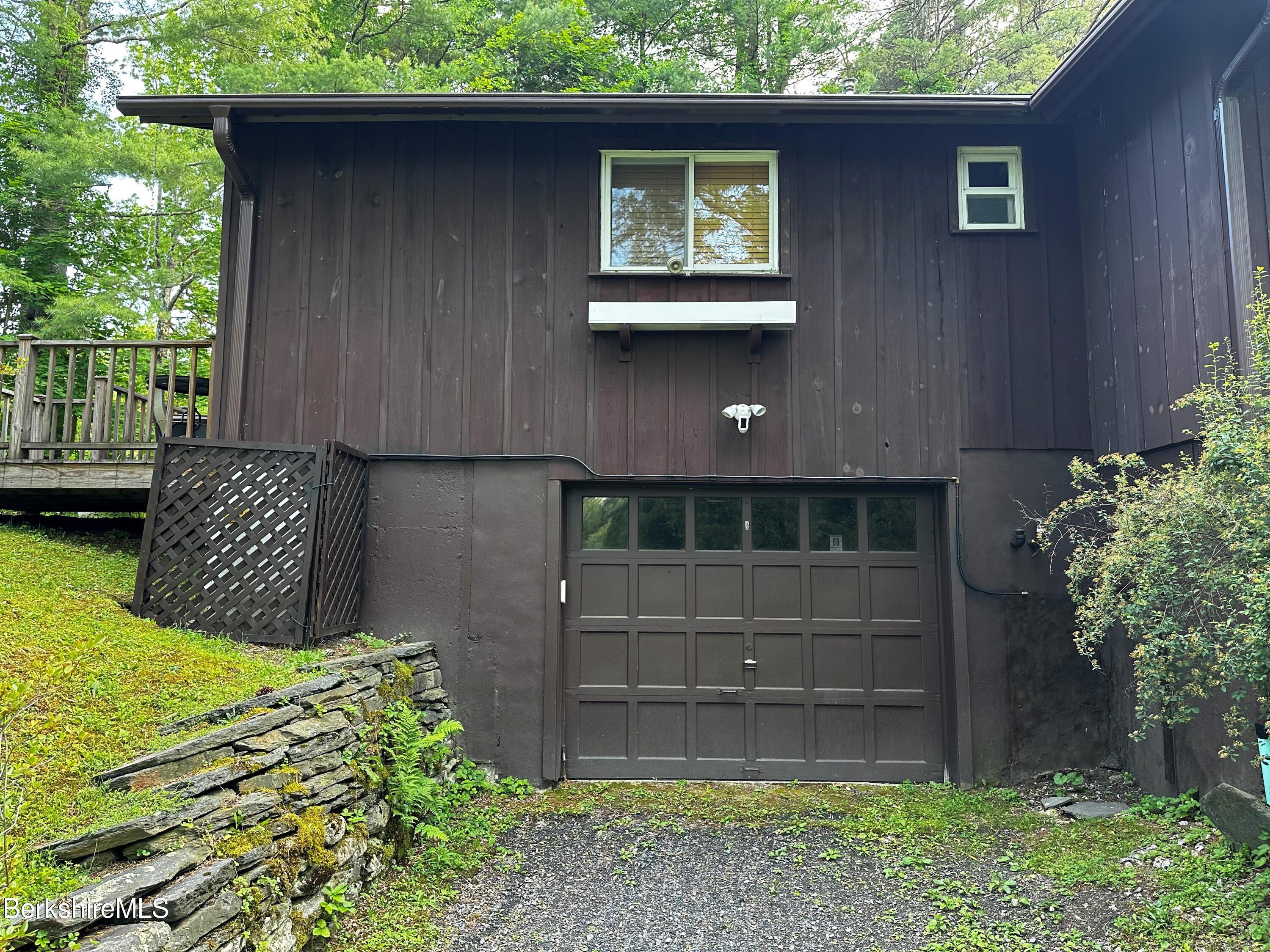 13 Cherry Hill Road Stockbridge, MA 01262 - Photo 9 of 41 a view of backyard with a tub and plants