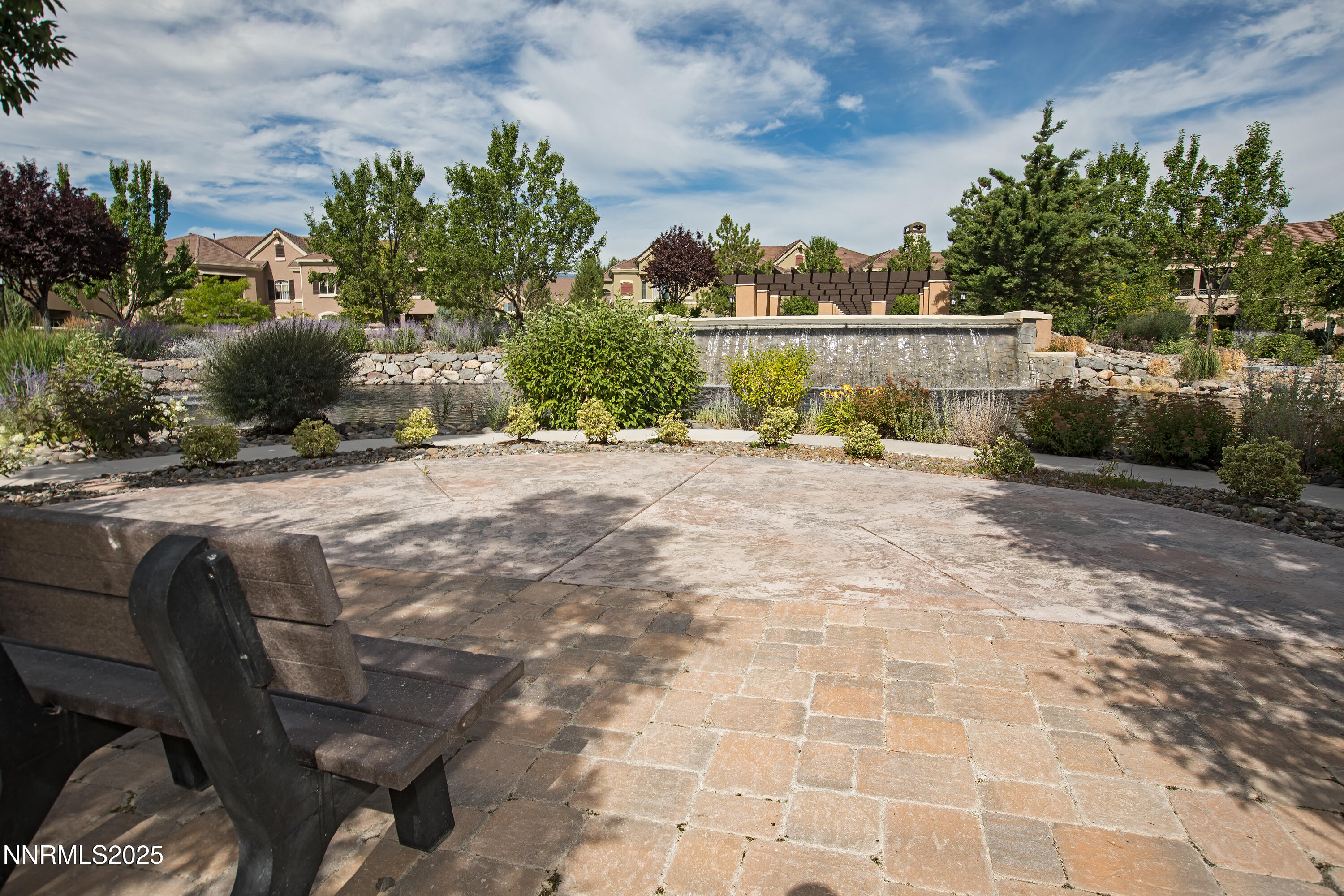 9900 Wilbur May Parkway, Unit 1802 Reno, NV 89521 - Photo 29 of 47 a backyard of a house with lots of green space