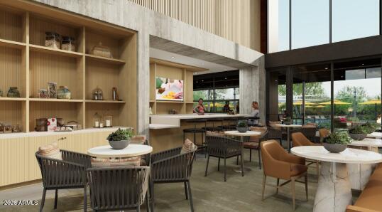 1959 West Caleb Road Phoenix, AZ 85085 - Photo 10 of 23 a dining room with furniture and a floor to ceiling window