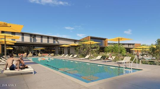 1959 West Caleb Road Phoenix, AZ 85085 - Photo 16 of 23 a view of a swimming pool with a lounge chairs