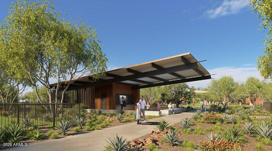 1959 West Caleb Road Phoenix, AZ 85085 - Photo 21 of 23 a patio with a table and chairs under an umbrella