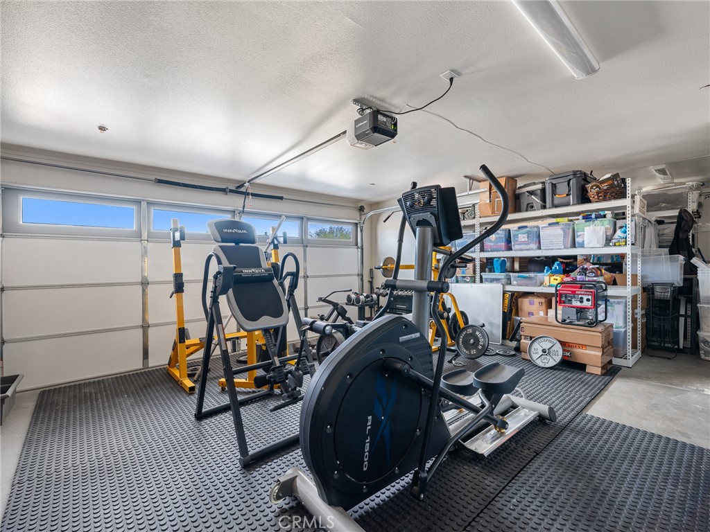 15620 Erie Road Apple Valley, CA 92307 - Photo 30 of 53 a view of a room with gym equipment