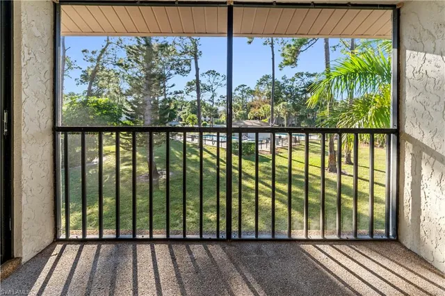 a view of backyard of a house
