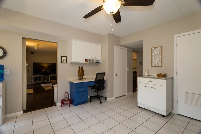 a view of workspace with wooden floor