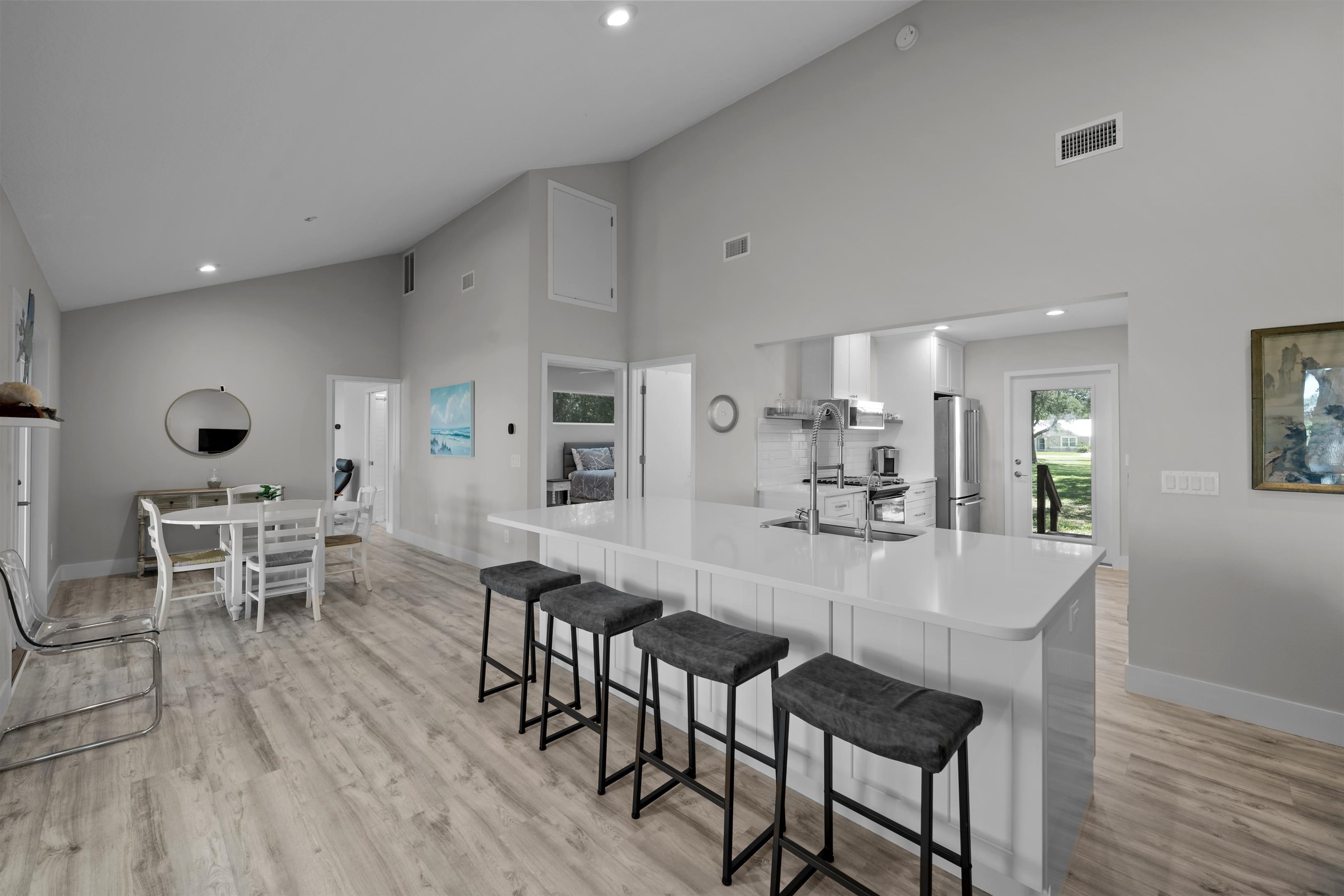 5425 Windantide Road St. Augustine, FL 32080 - Photo 11 of 33 a dining room with furniture and wooden floor