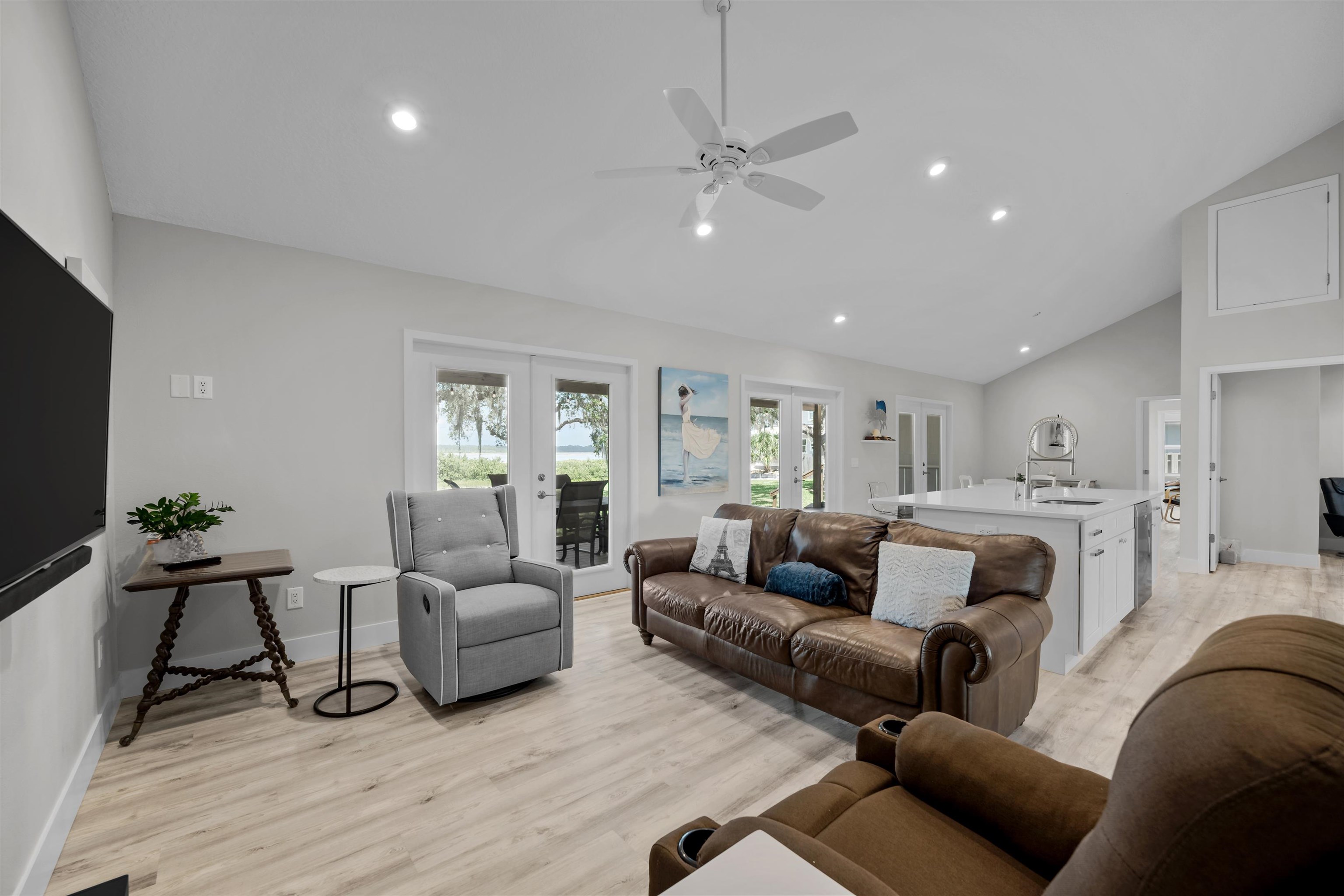 5425 Windantide Road St. Augustine, FL 32080 - Photo 13 of 33 a living room with furniture and a flat screen tv