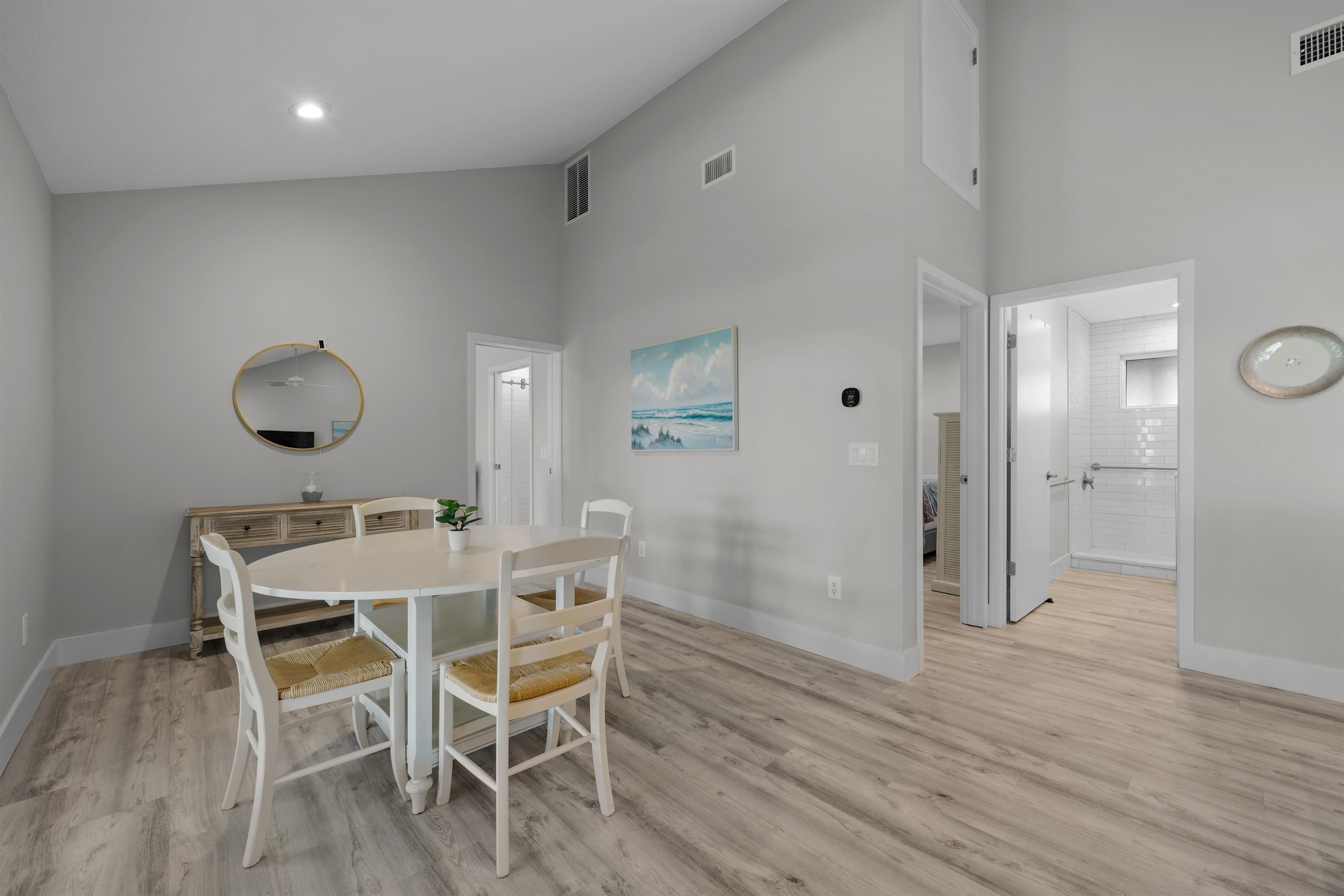 5425 Windantide Road St. Augustine, FL 32080 - Photo 19 of 33 a view of a dining room with furniture and wooden floor
