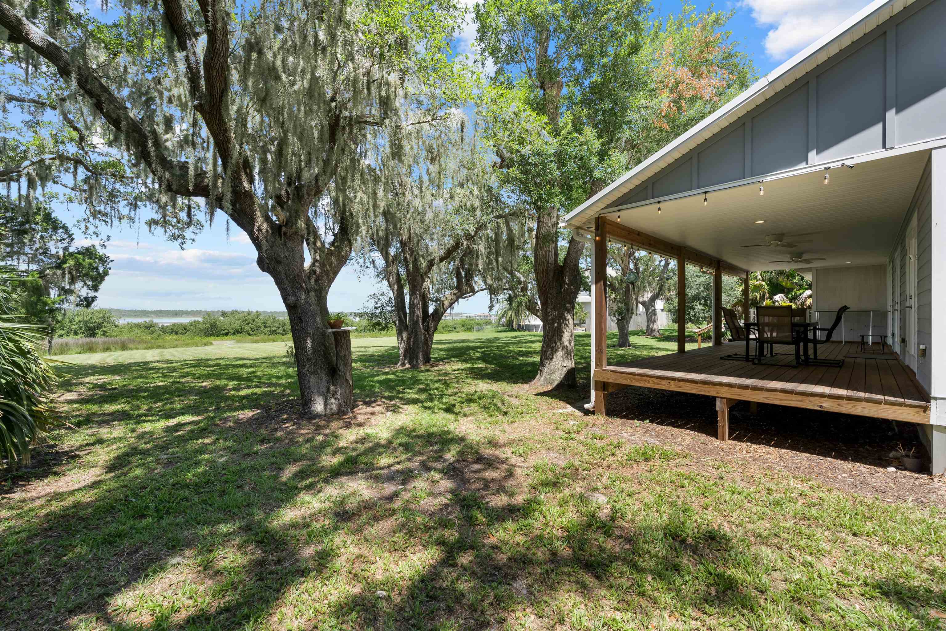 5425 Windantide Road St. Augustine, FL 32080 - Photo 4 of 33 a view of outdoor space with trees