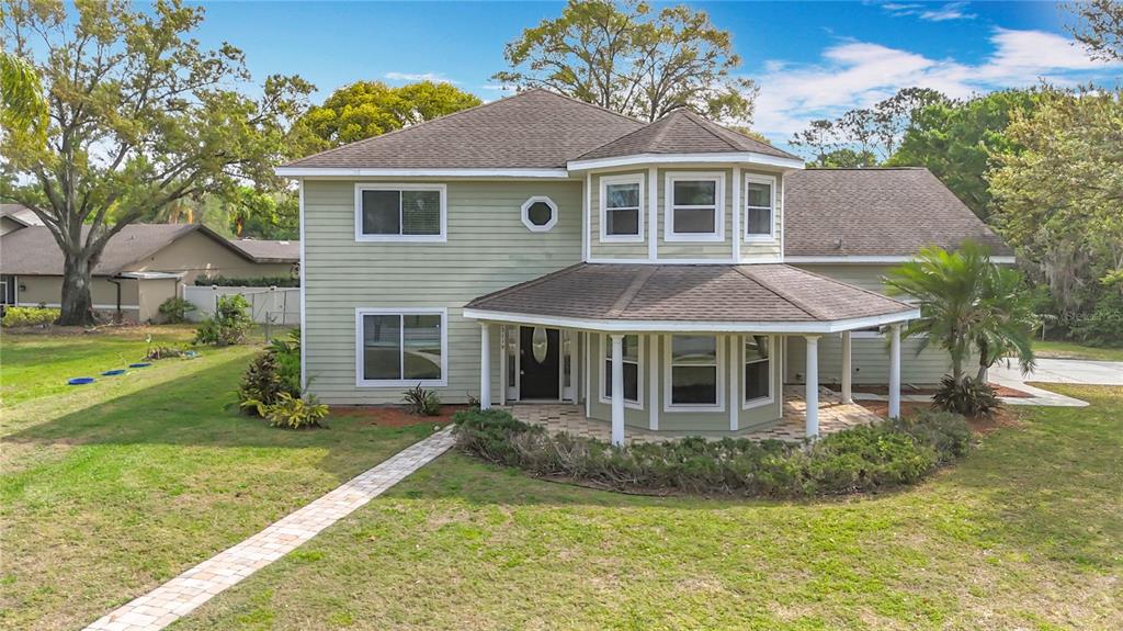 front view of a house with a yard