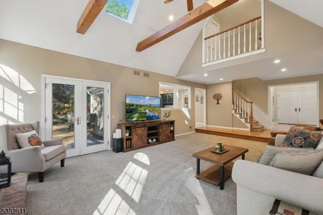 a living room with furniture and a couch