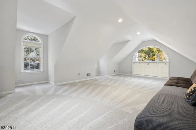 wooden floor in front of a white house
